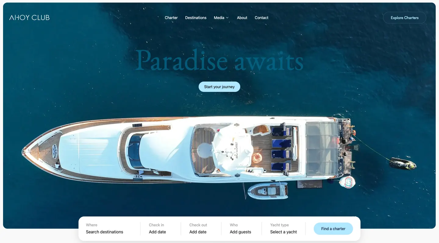 Ahoy Club homepage: aerial yacht hero with a charter search bar for destination, dates, guests and yacht type
